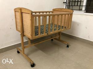 Sparingly used kids wooden cradle