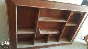 Teak wood showcase in very good condition..call