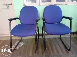 Two Purple And Gray Folding Chairs
