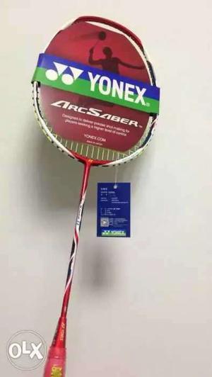 White And Red Yonex Badminton Racket