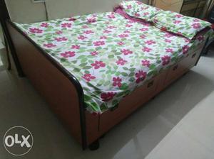 White, Green, And Pink Floral Bedspread