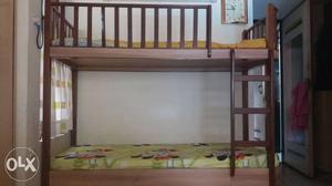 Wooden Bunk Bed with storage on two sides. Inside
