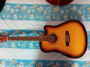 A good acoustic guitar.. Awesome sound quality n