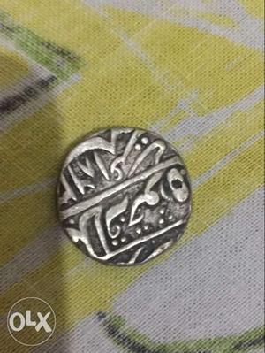A very old pure dilver coin with urdu scripted