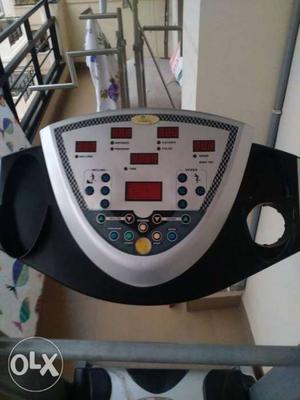 Black And Gray Treadmill which is in working condition