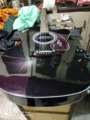 Black And Purple Acoustic Guitar