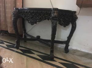 Black color traditional console table made of