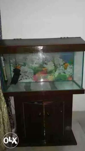 Fish aquarium with wooden shelf stand size of