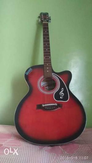 Givson Red And Black Acoustic Guitar