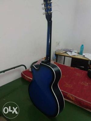 Givson six string, semi acoustic guitar