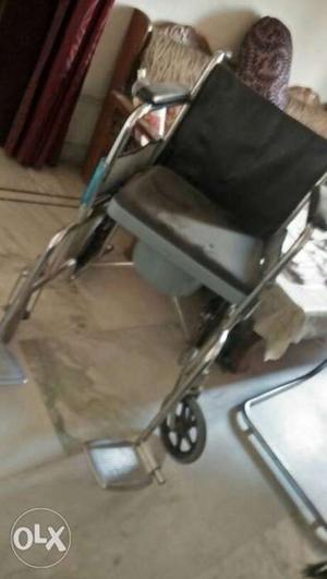 Unused folding wheel chair