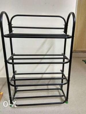 Brand new iron shoe stand for sale, unused.