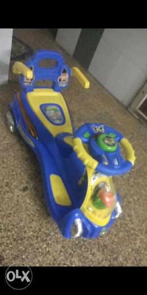Children's Blue And Yellow Ride-on Toy