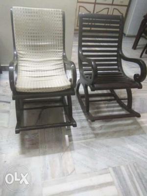 Set of two rocking chairs of teak wood in a very