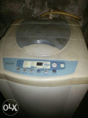 White And Blue Front-load Clothes Washer