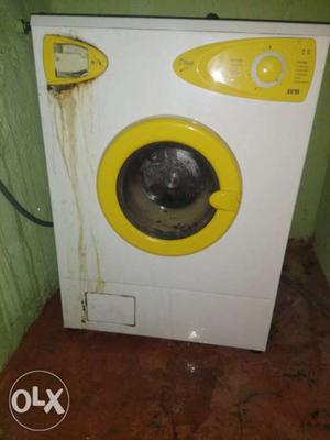 Yellow And White Front-load Washing Machine