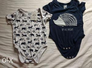 2 new rompers (9-12months)& 1 new t-shirt(9