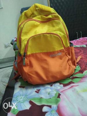 American tourister yellow casper backpack 24L