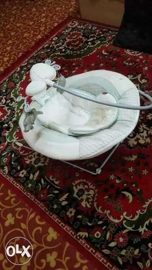 Baby's White And Gray Bouncer