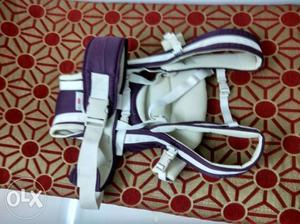 Baby's White And Purple Carrier