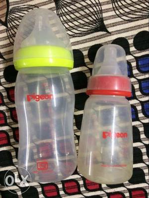 New White And Red Plastic Feeding Bottle