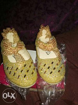 New pair of branded shoes for small baby girl