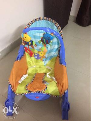 Newborn to Toddler portable rocker chair in good condition