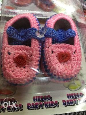 Pair Of Pink-and-blue Knitted Shoes
