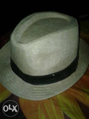 Smooth cream colour hat size % cotton 65% please do not