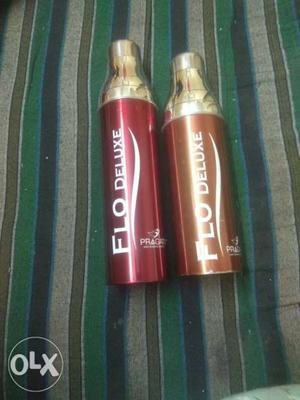 Two Brown-and-gray Flo Deluxe Bottles