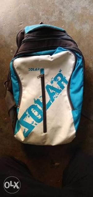 White And Teal Solar Backpack