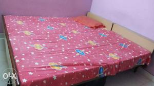 2 single wooden beds for sale