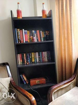 6 month old wooden bookshelf
