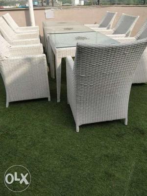 Four White Wicker Armchairs With Coffee Table