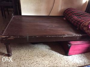 Rectangular Brown Wooden bed in excellent condition.