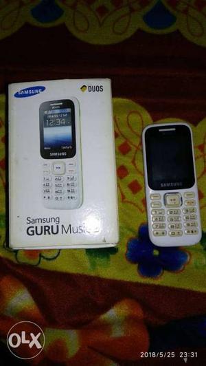 Samsung guru music 2 with box bill and charger