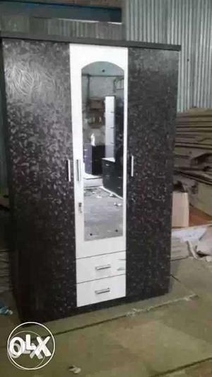 Three door wardrobe with mirror