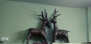 Two Black Deer Statues