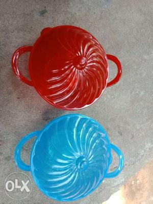 Two Red And Blue Ceramic Bowls