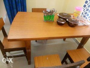 Wood dining table and four chairs