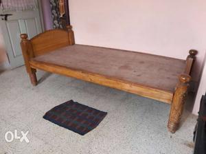 Wooden cot excellent condition for more details