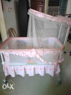 Baby crib with mosquito net