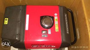 Black And Red Honda Portable Generator