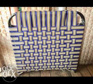 Blue And Brown Woven Folding Bed