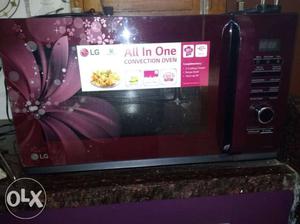 Red LG Digital Microwave Oven