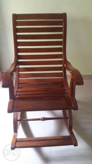 Rocking teakwood chair.