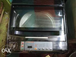 Whirlpool top load washing machine with home step