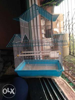 Blue And Gray Metal Cage
