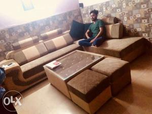 1 month old L shape sofa set with table. Original price