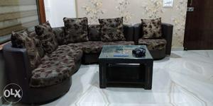 6 seater sofa and center table in good condition.